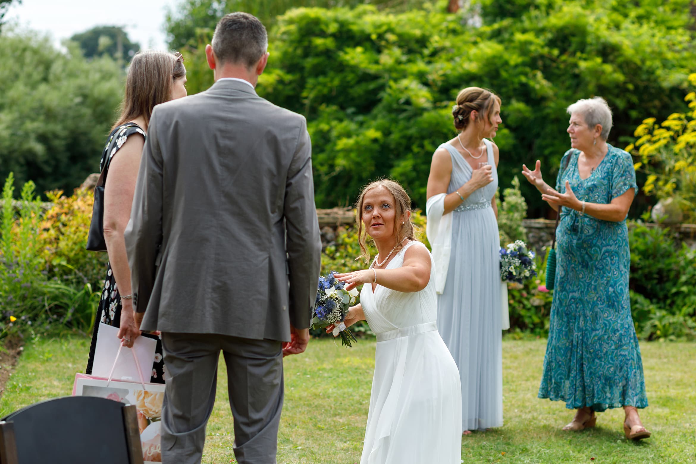 the bride talks to her guests