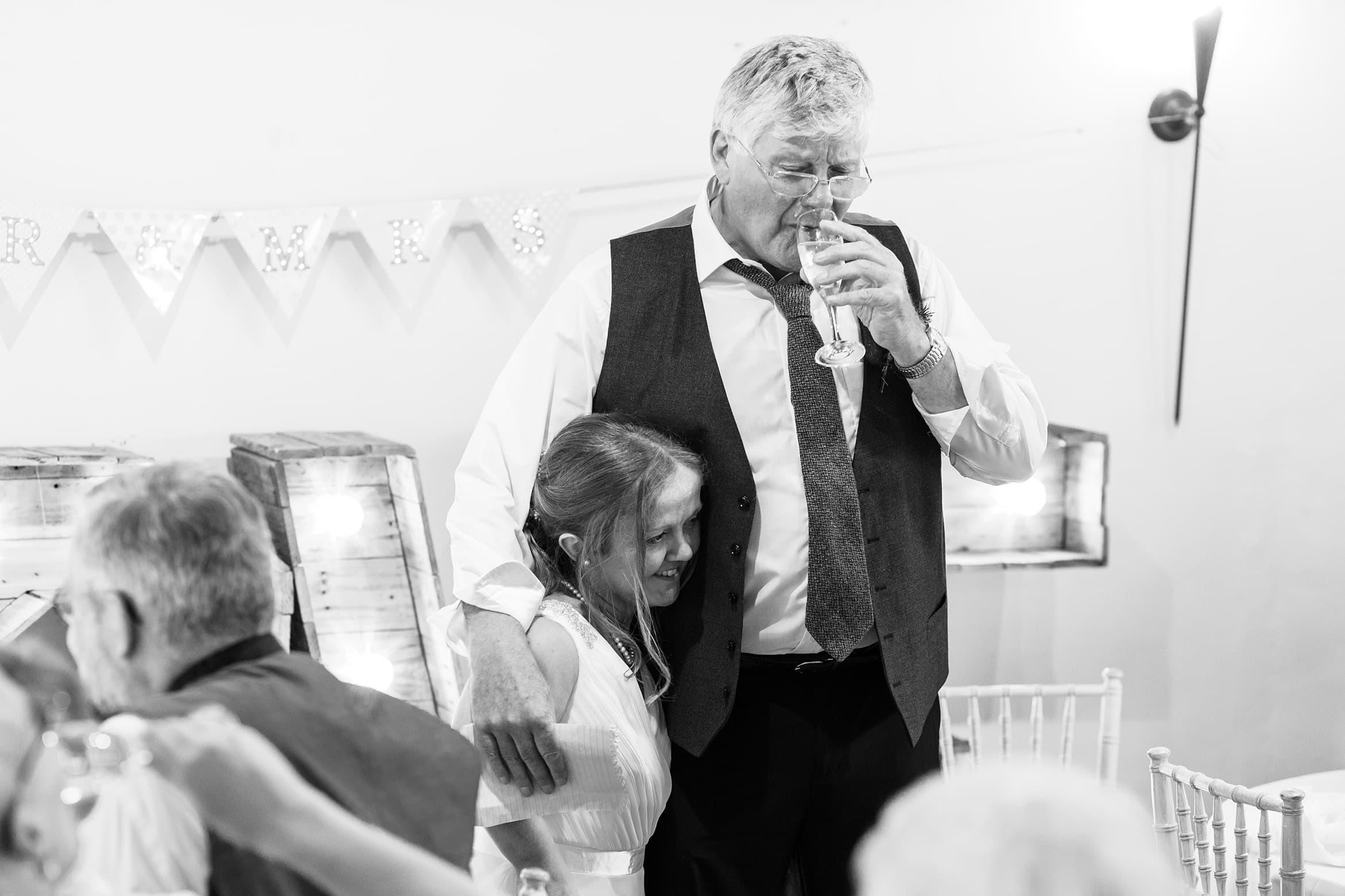 the bride hugs her dad