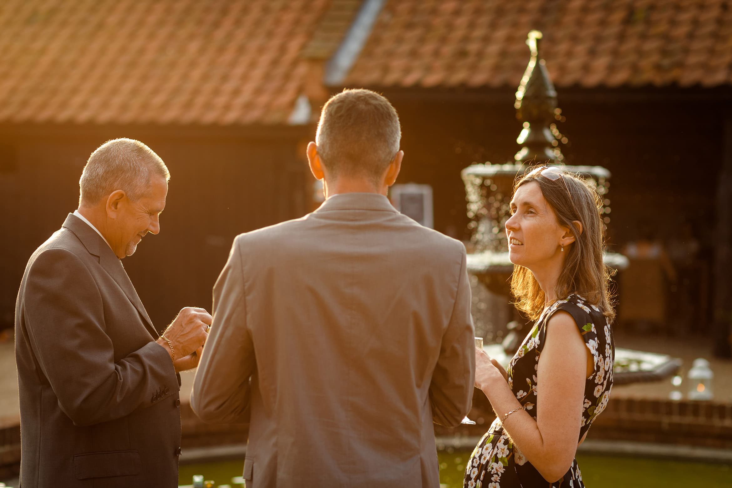 wedding guests enjoy the sunshine