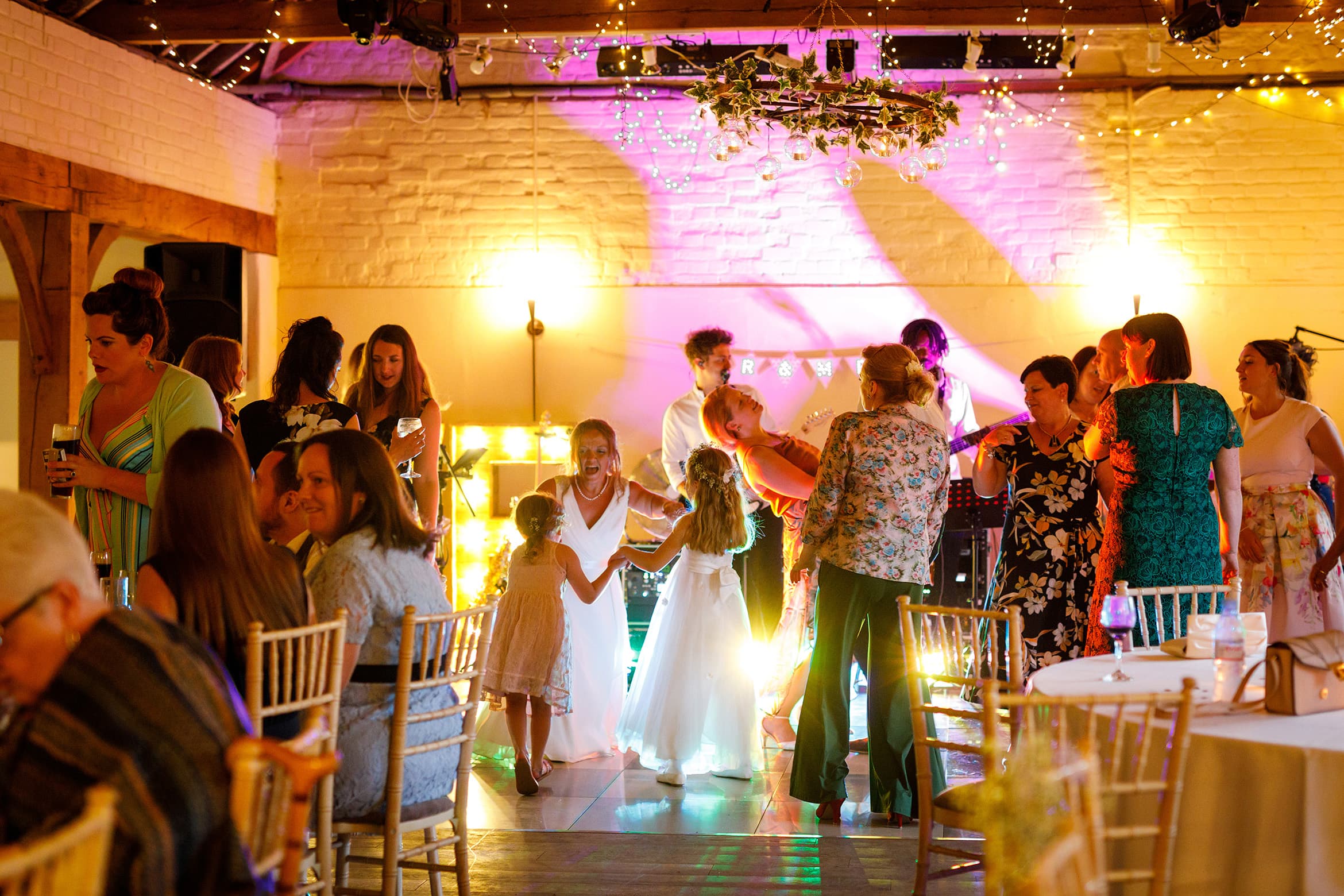 the bride dances with the girls