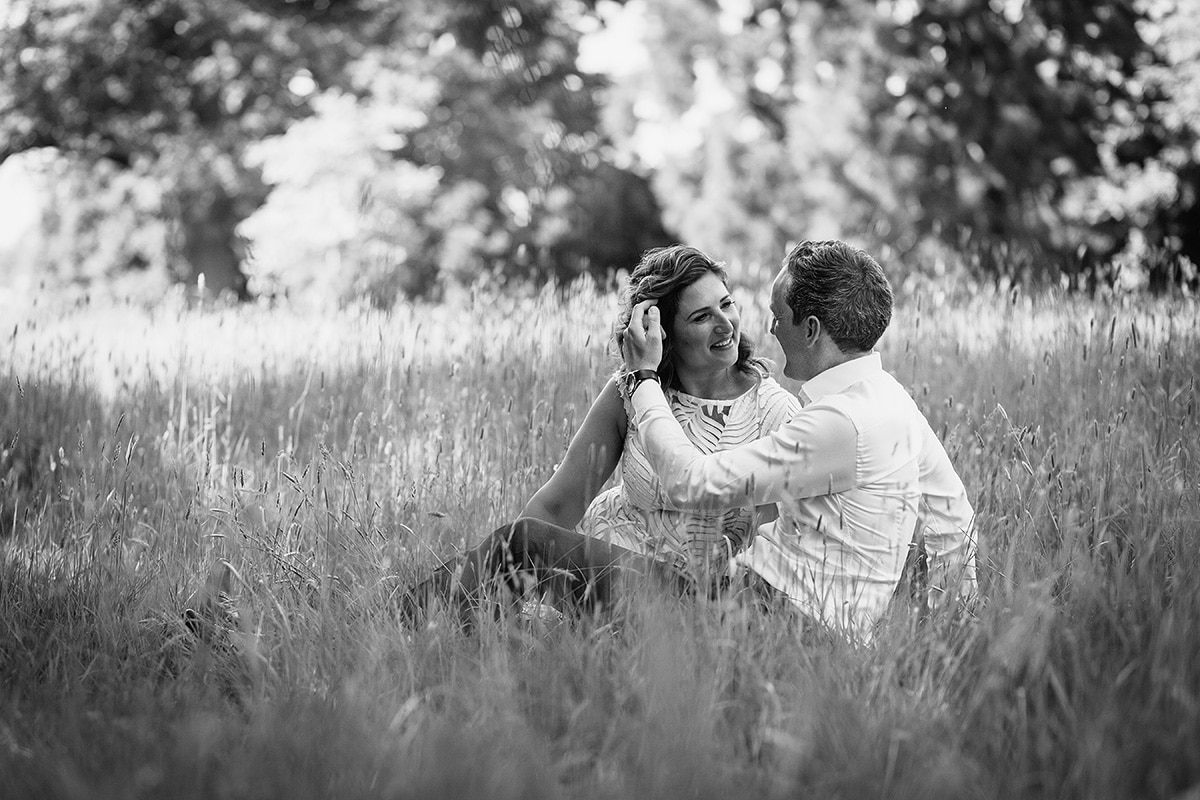 a touching moment in the grass at hedsor house