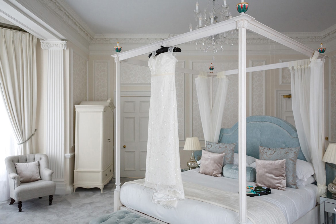 wedding dress hanging in the hedsor house bridal suite