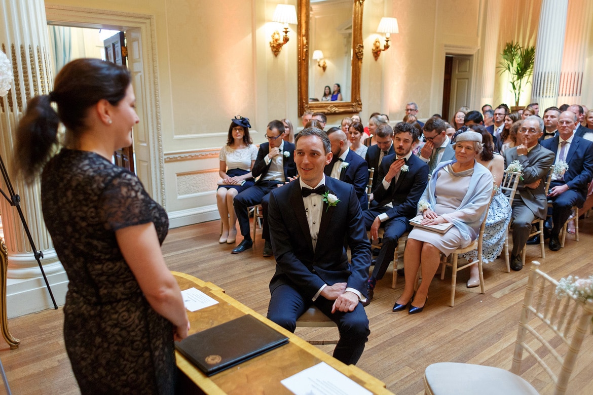 the groom waits in the centre hall