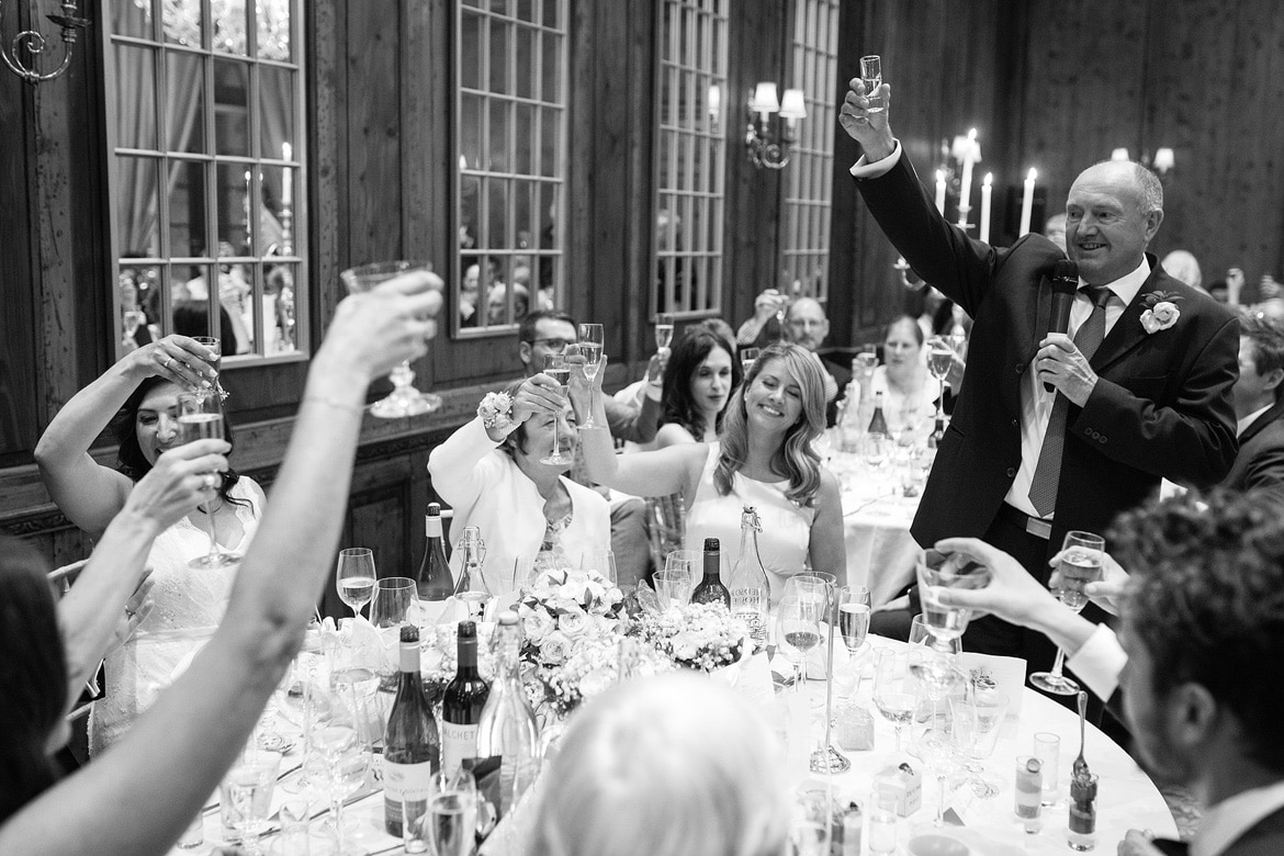 the father of the bride raises a toast