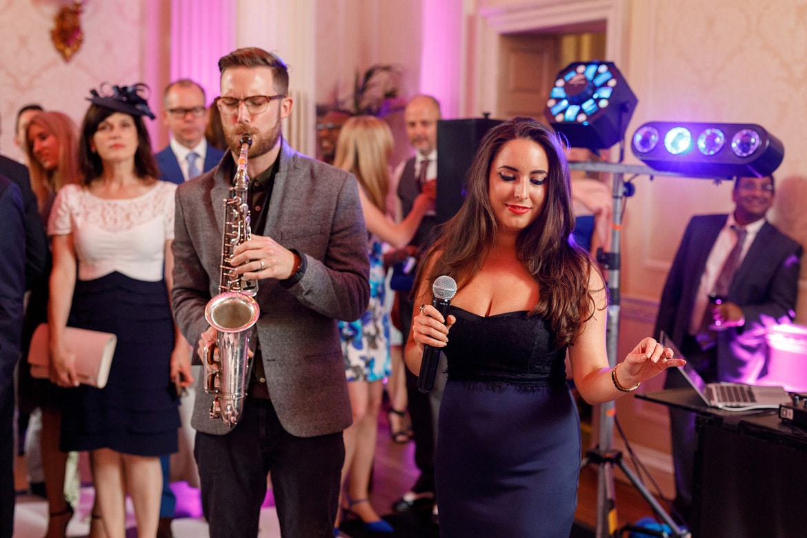 guests sing for the bride and groom