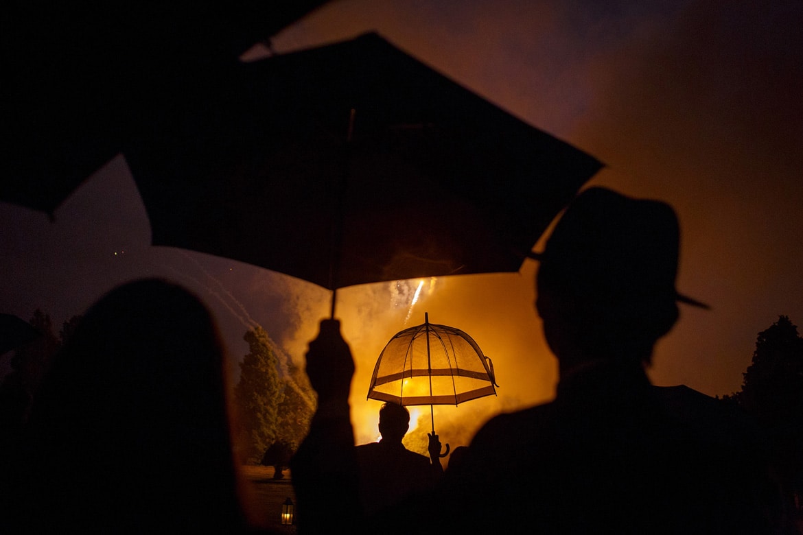 umbrellas during a hedsor house firework display