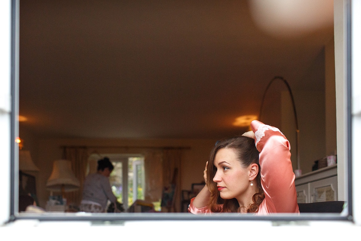 the bride taken through an open window