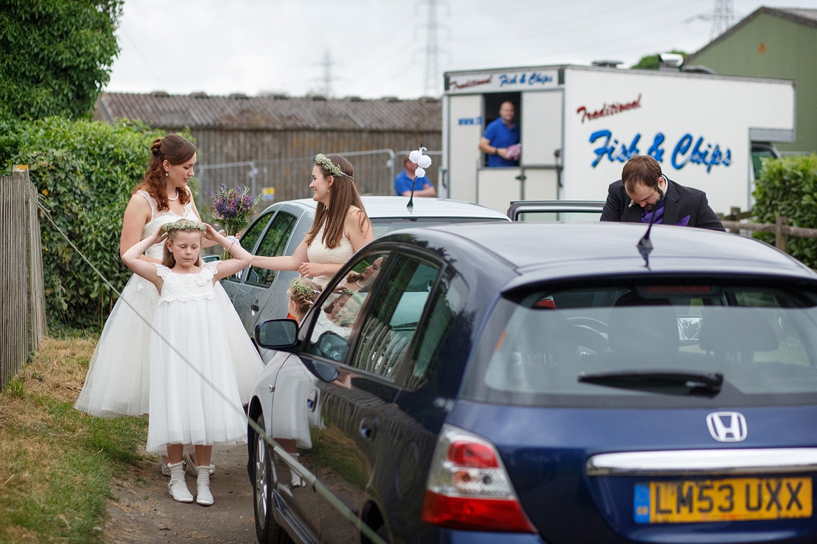 the bride and her family arrive at the church