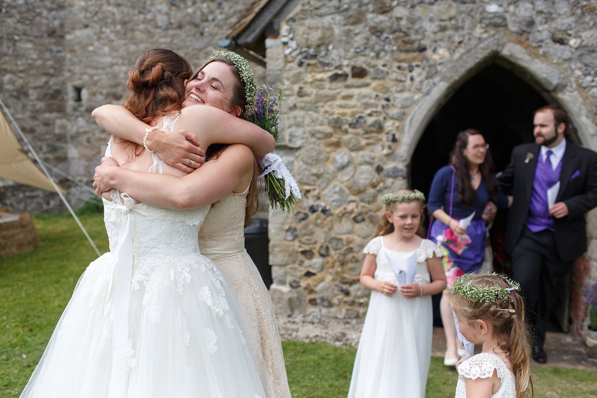 the bride hugs her sister