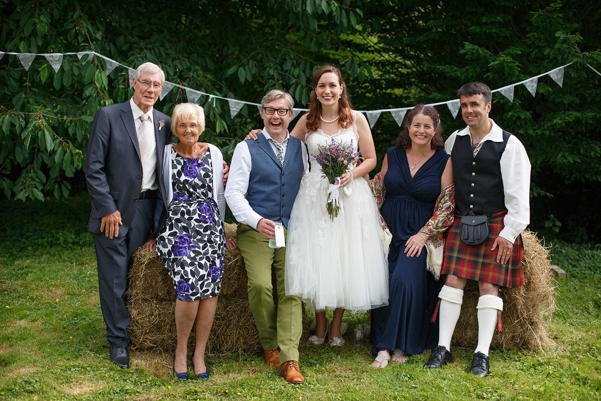 bride and groom with their families