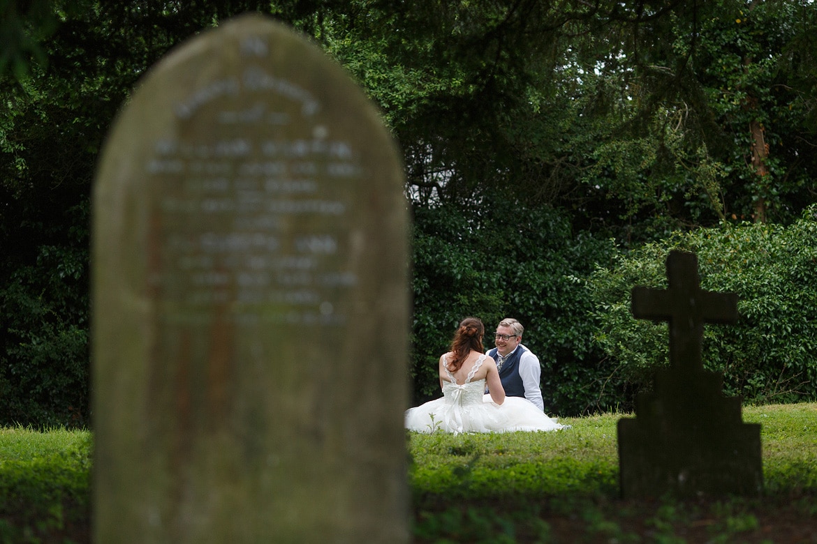 bride and groom sneak off for a little alone time