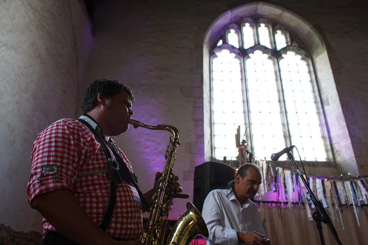 a saxophone player in lederhosen