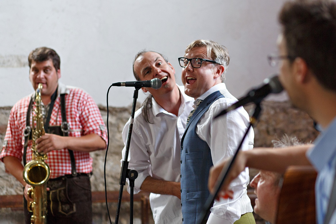 the groom sings with the band