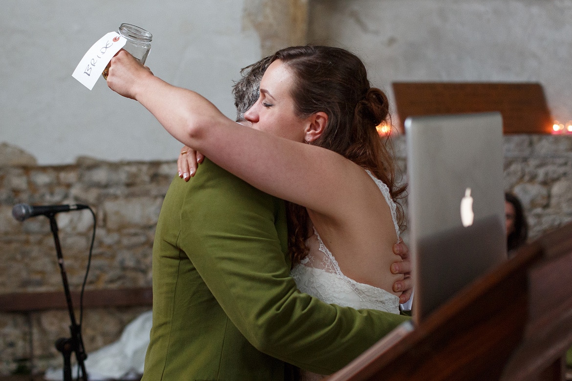 bride and groom embrace