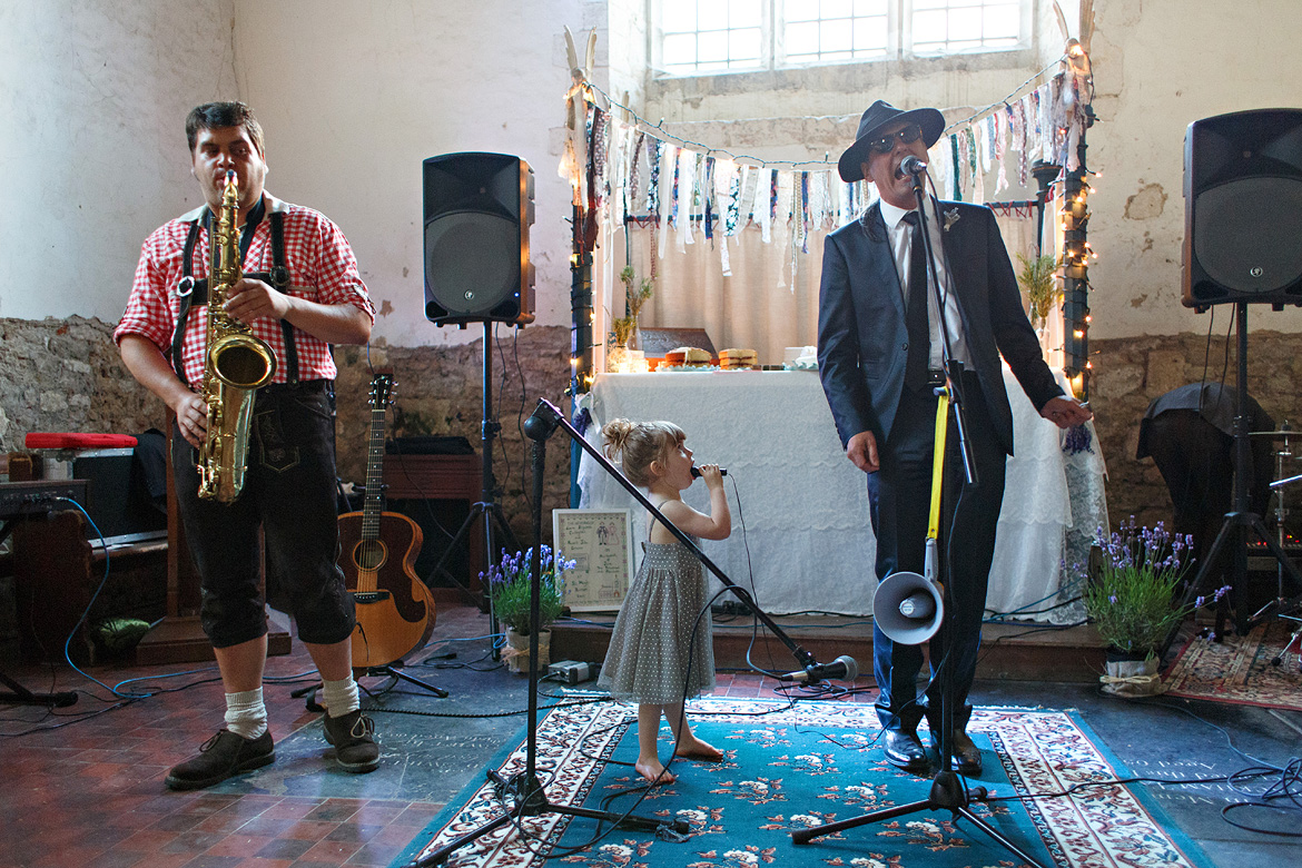 a child sings with the band