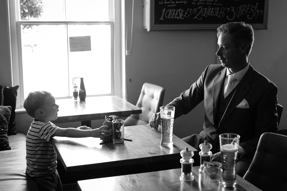 the groom and his son in the saracens head pub in great dunmow