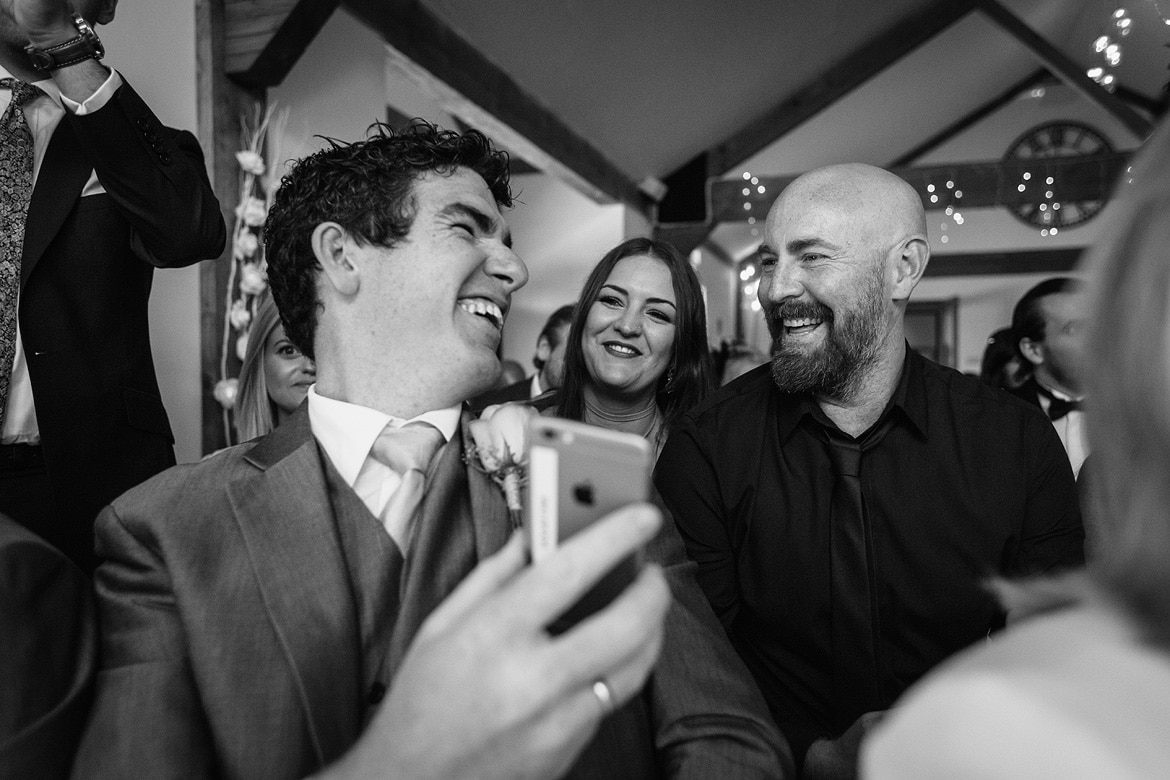 guests laughing in the ceremony room