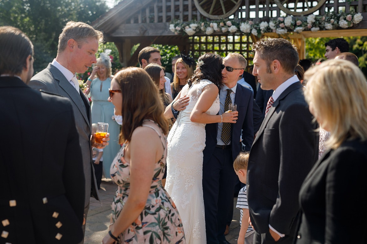 The bride greets her guests