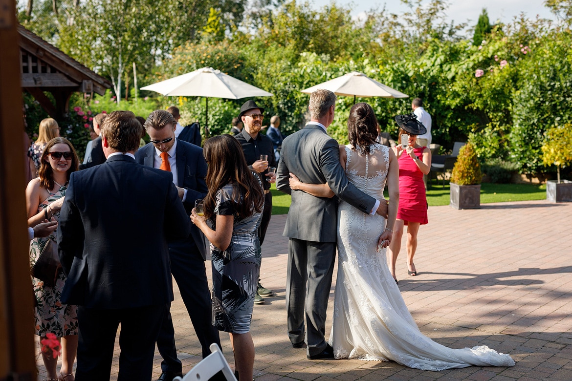 bride and groom in the maidens barn courtyard