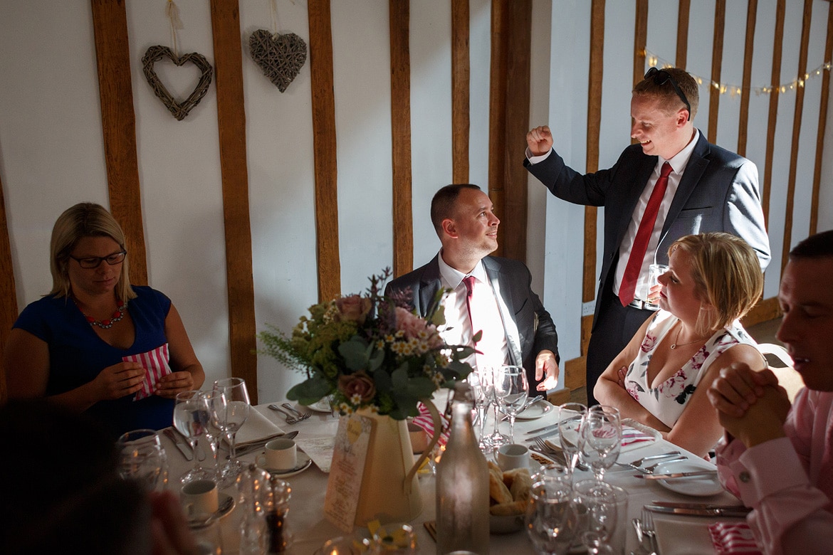 guests sit down for the wedding breakfast