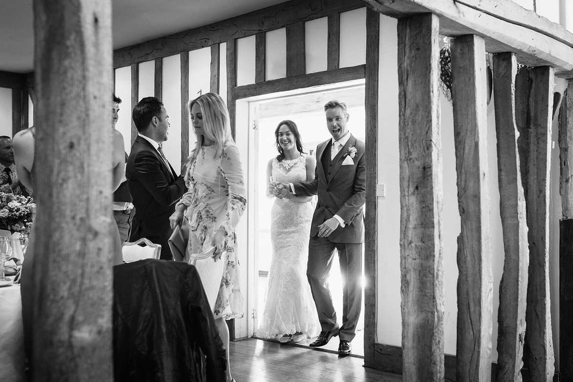 bride and groom enter the room