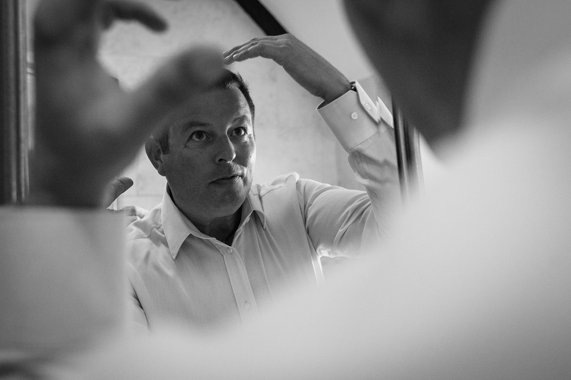 the groom gets ready at cley mill