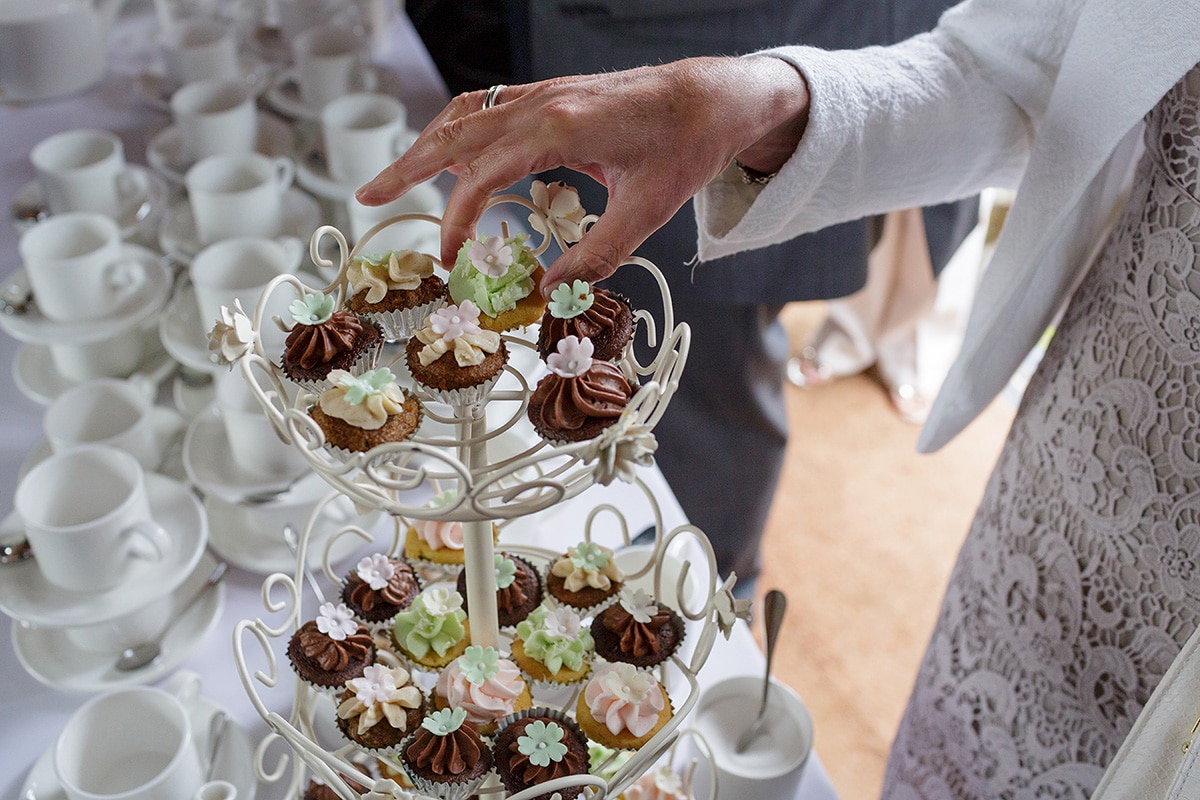 guests enjoy cupcakes before the wedding