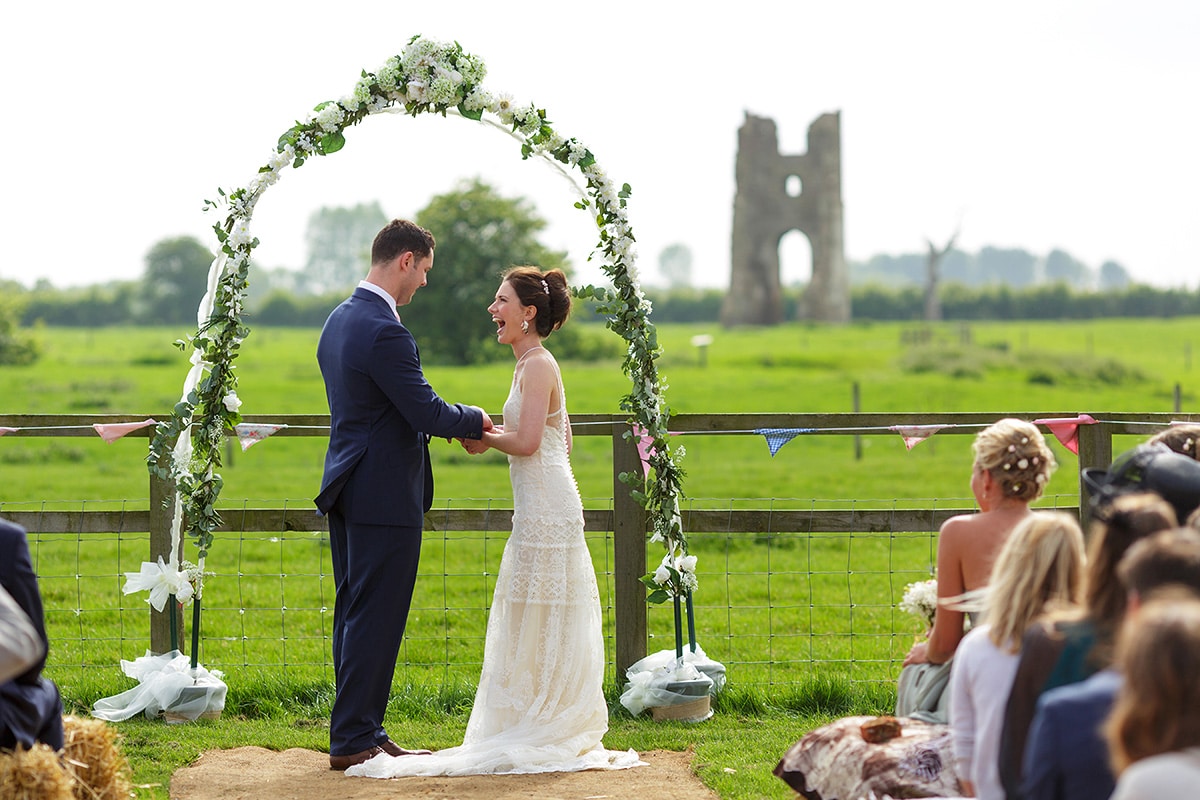 an outside wedding ceremony at godwick hall