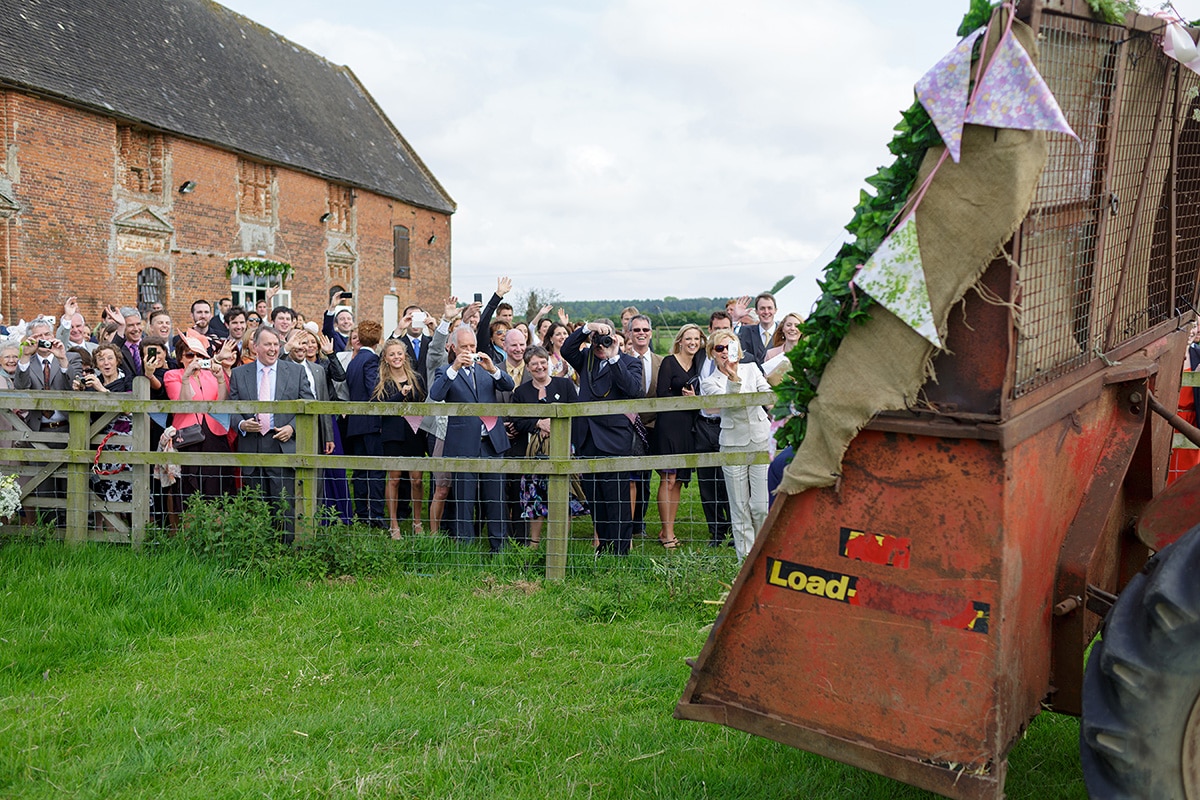 guest wave off the bride and groom