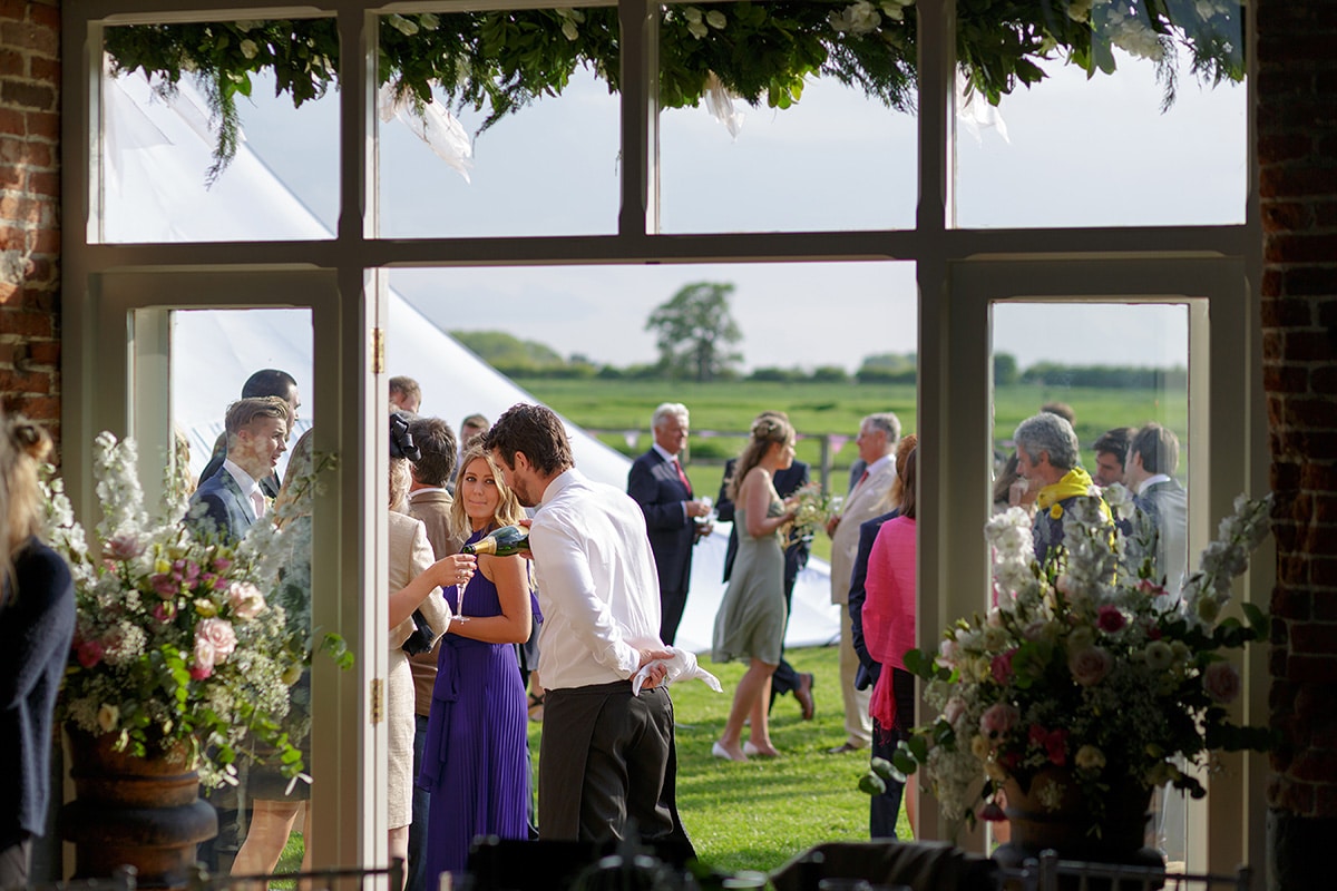 a view of the guests from inside godwick barn