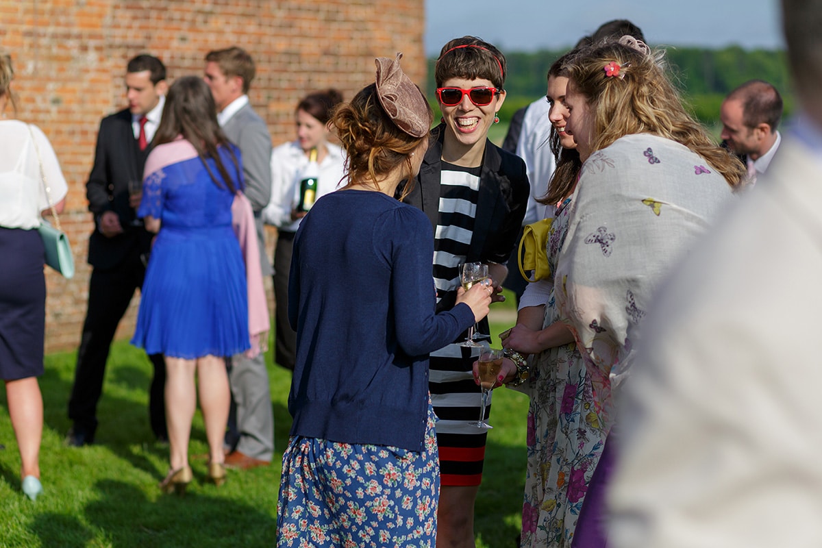 guests talk outside godwick barn