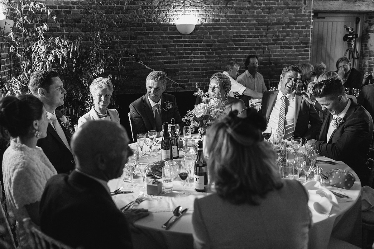 wedding guests inside godwick barn