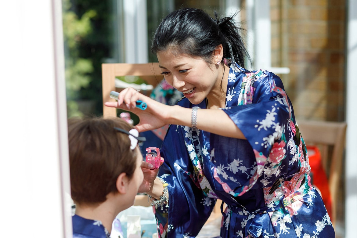 kates bridesmaids apply each others makeup