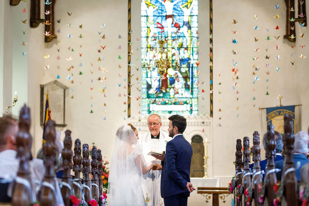 a wedding ceremony in bergh apton church