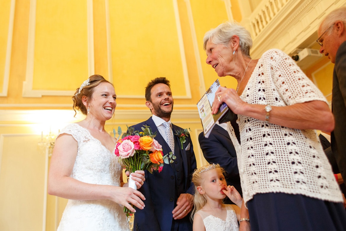 kate and daniel welcome guests to the music room