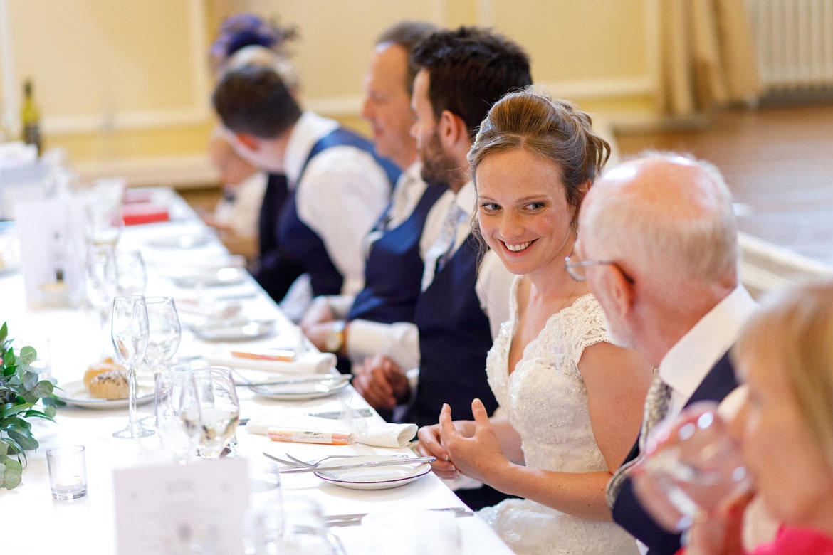 the bride smiles at her father