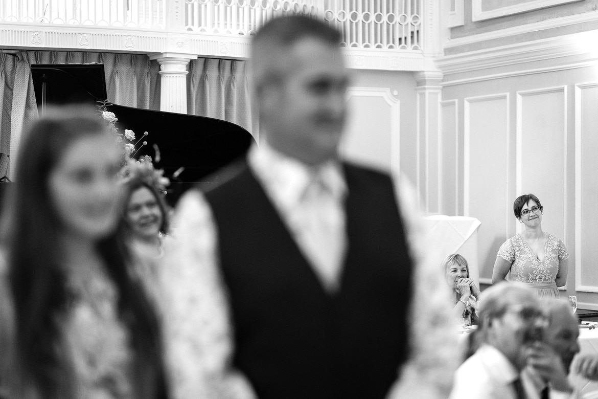 guests stand during the speech