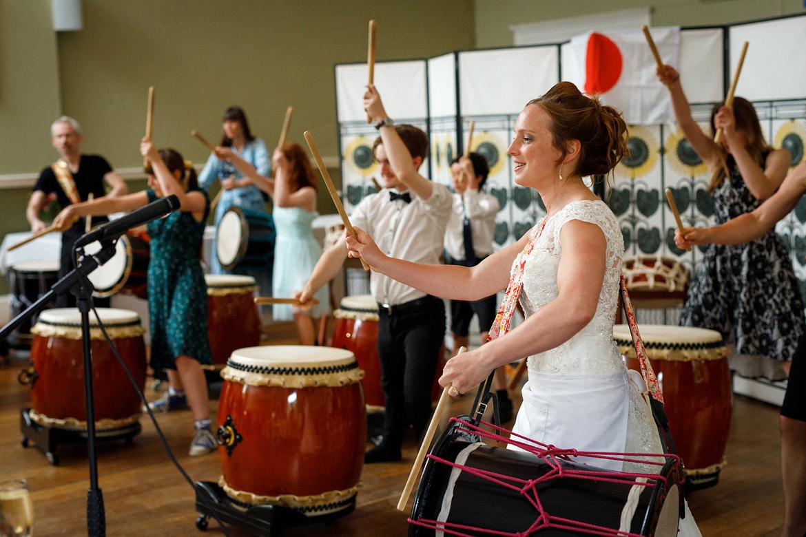 the bride leads the taiko drumming