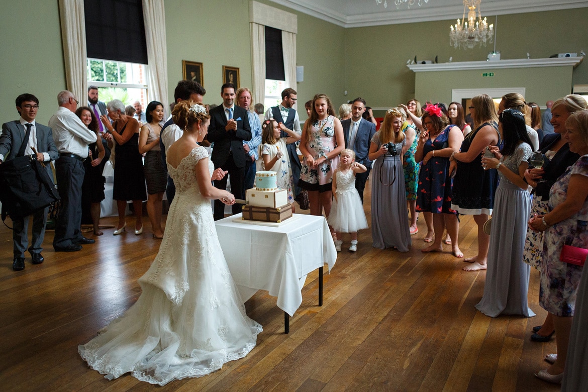 kate and daniel cut the cake