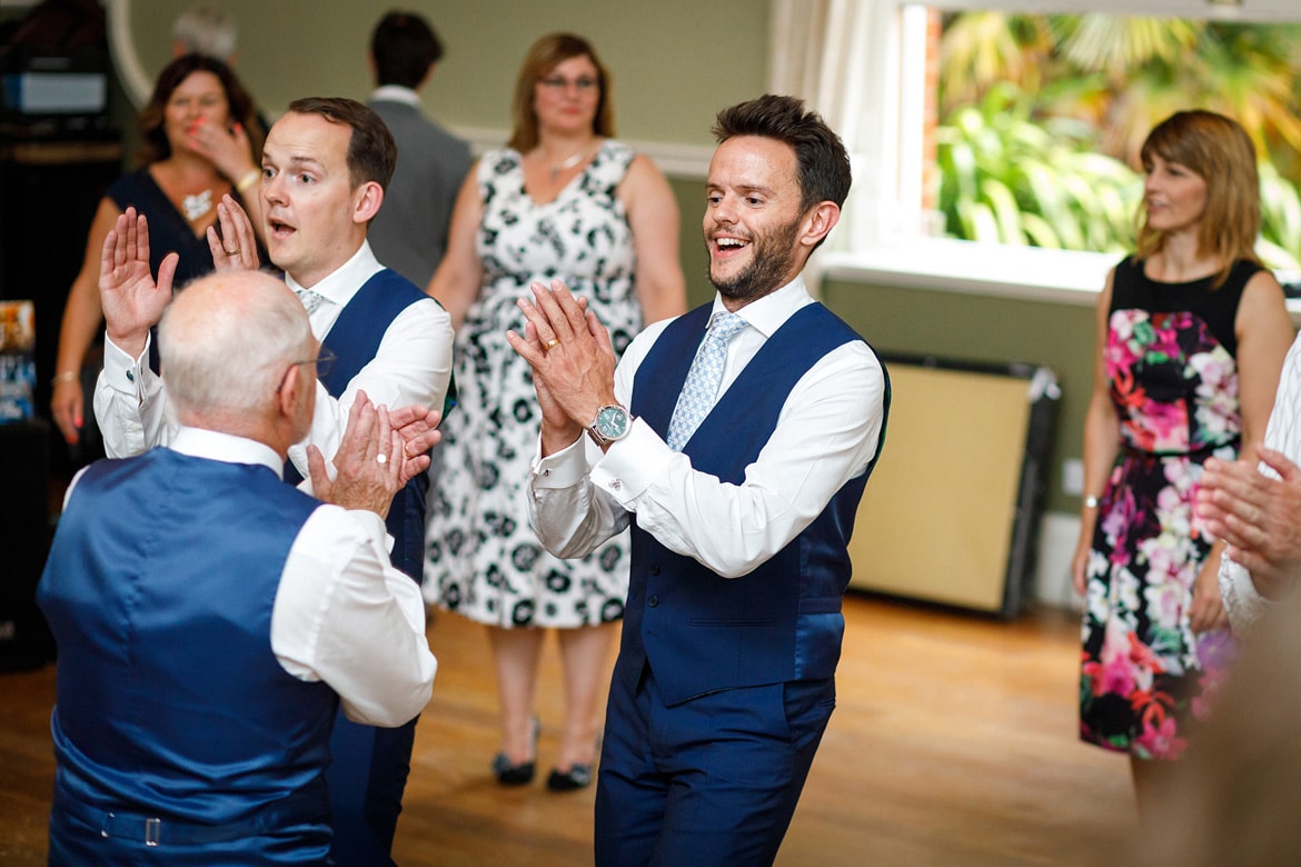 the groom dances during the ceilidh