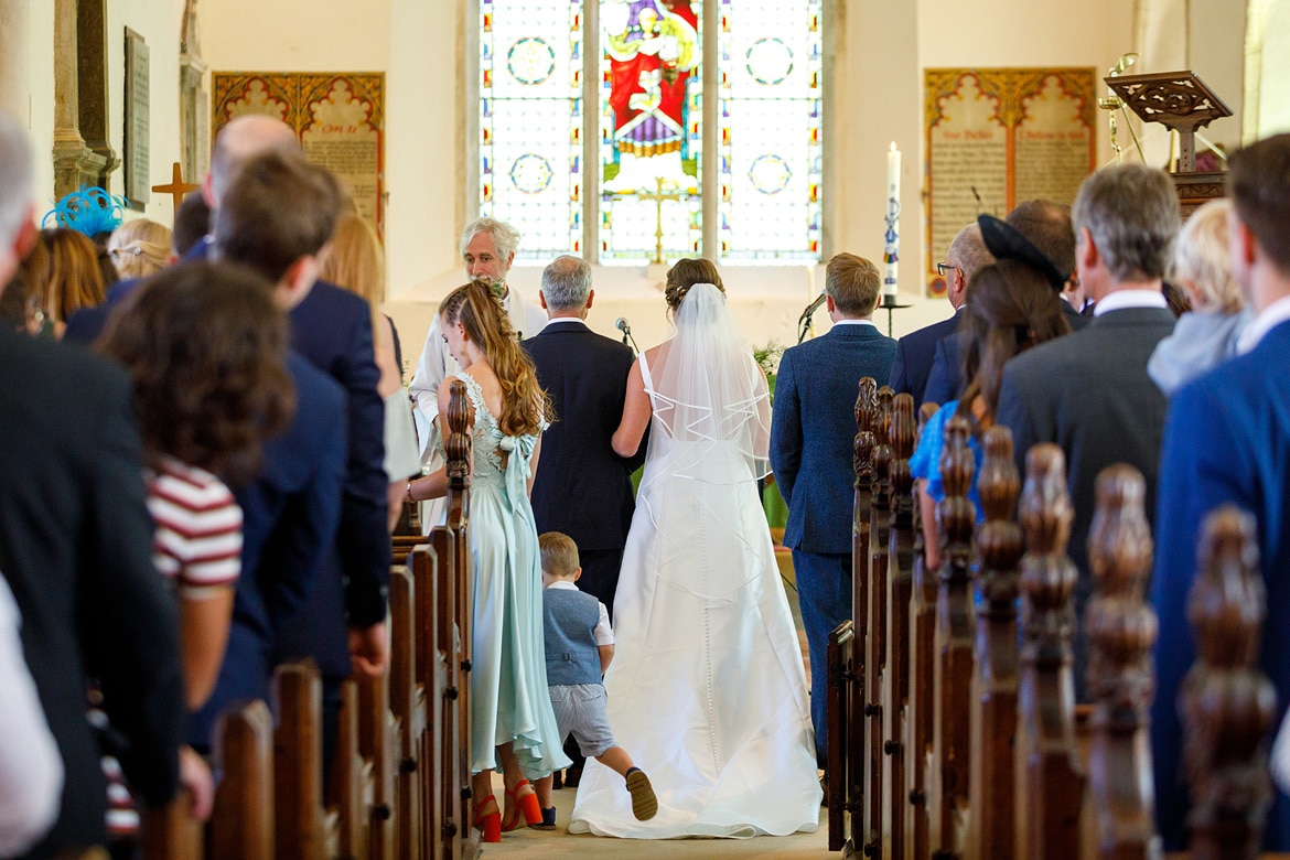 esther arrives at the front of the church