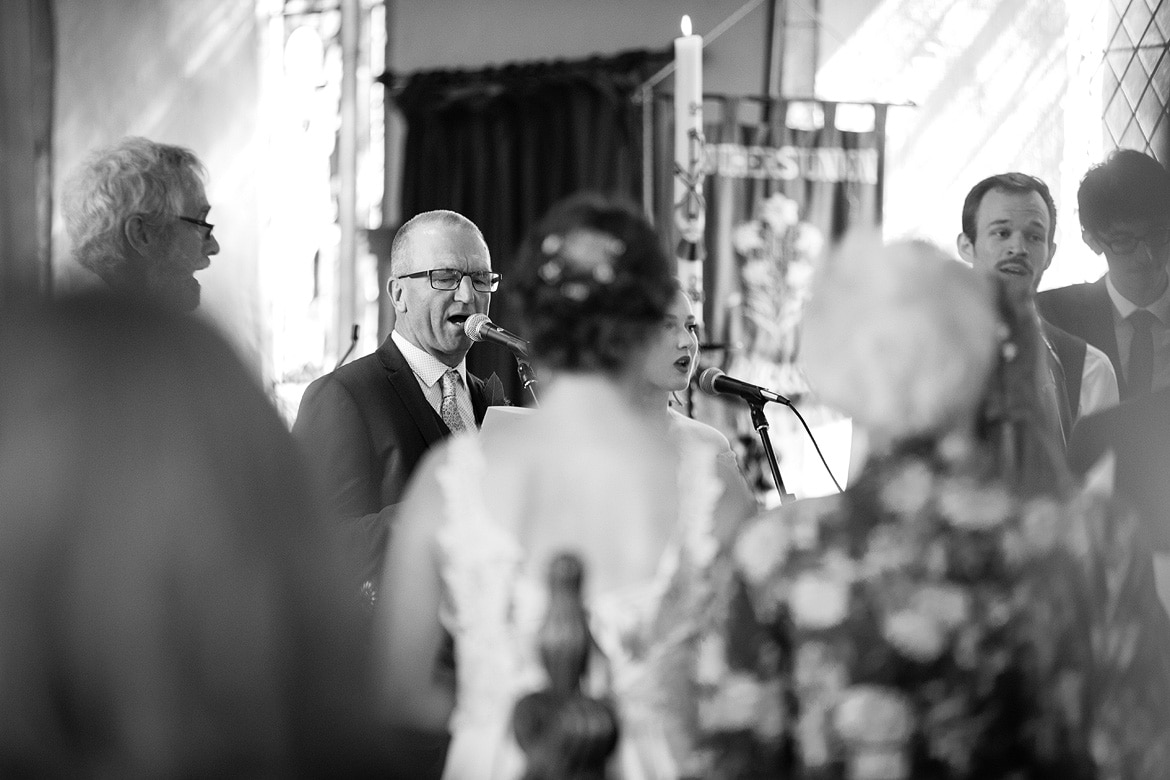 the grooms father sings