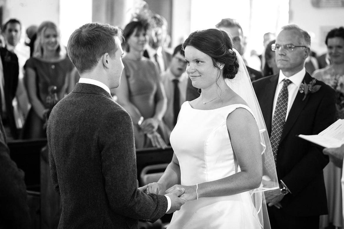 bride and groom giving their vows