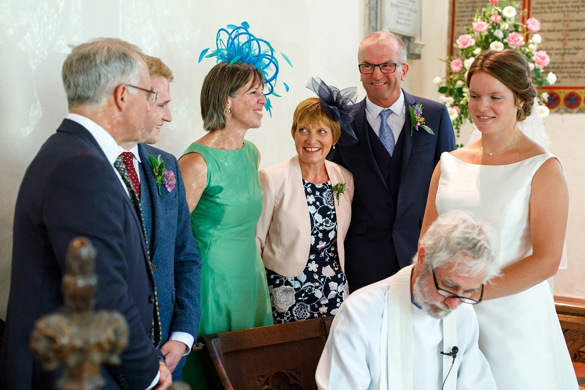 the parents chat during the signing of the register