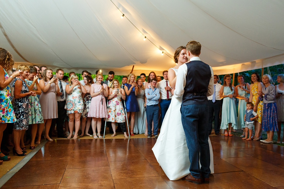 as the couple start their first dance