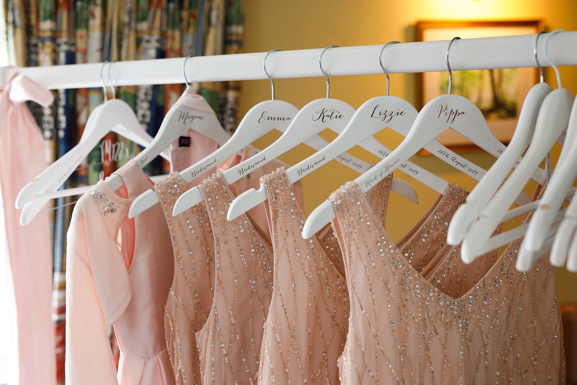 bridesmaids dresses hanging on personalised hangers
