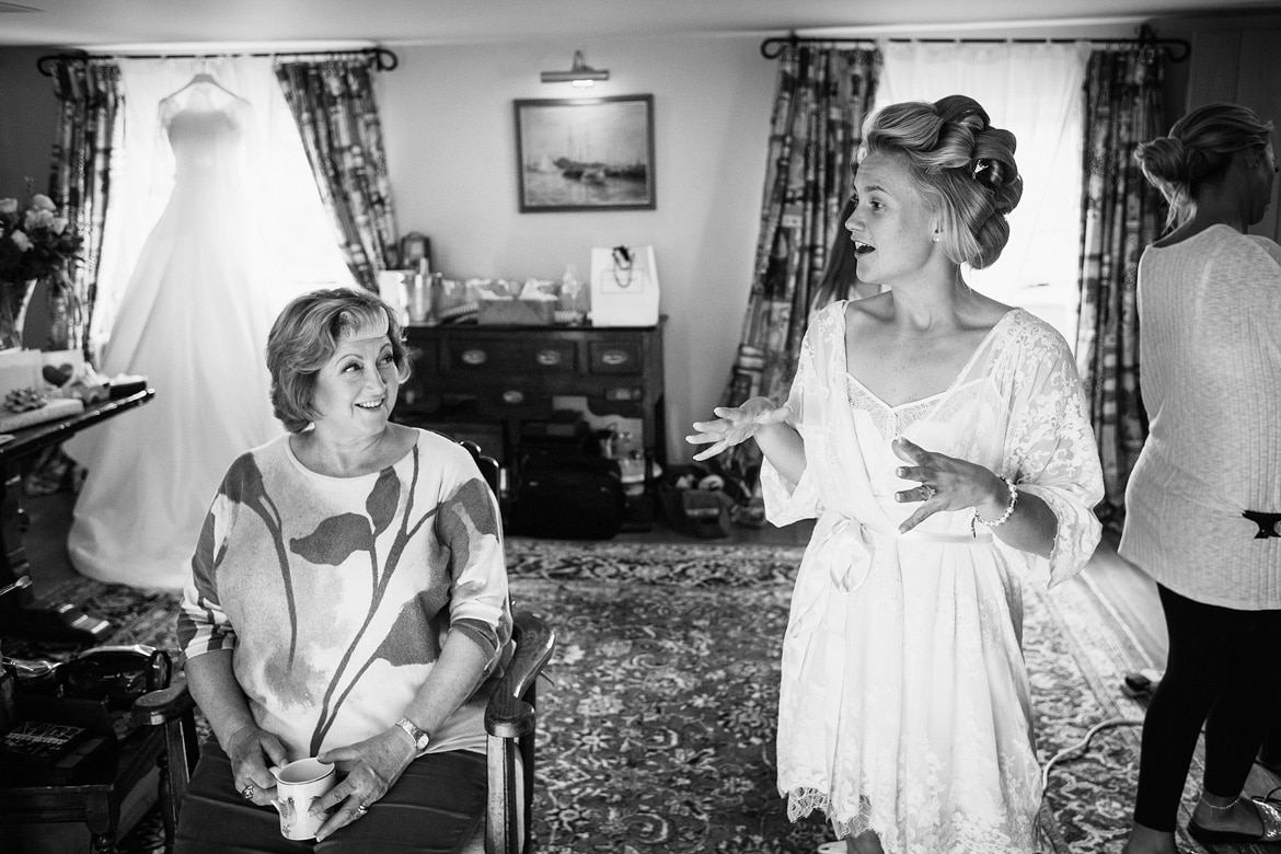 a bride and her mother enjoy a moment