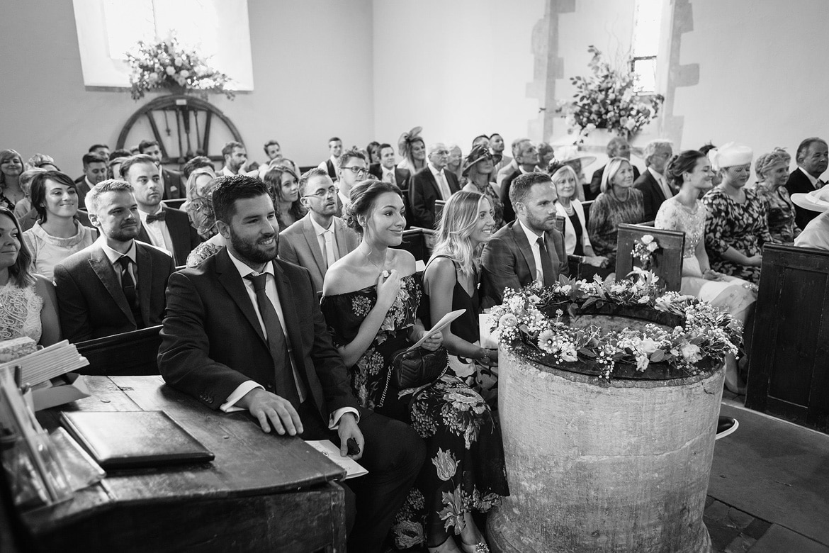 guests watch the wedding ceremony