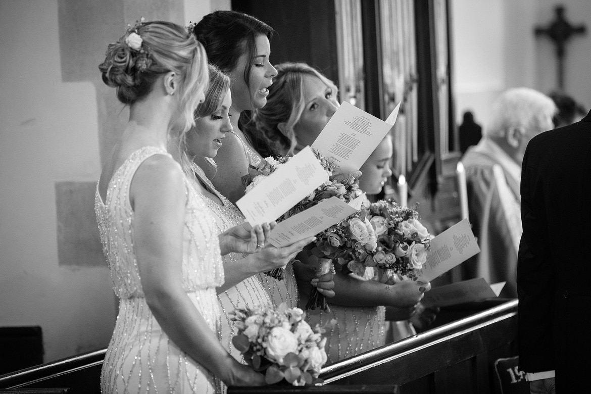 bridesmaids singing hymns