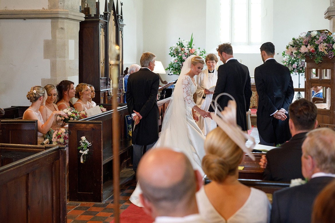 the bride looks back at the congregation